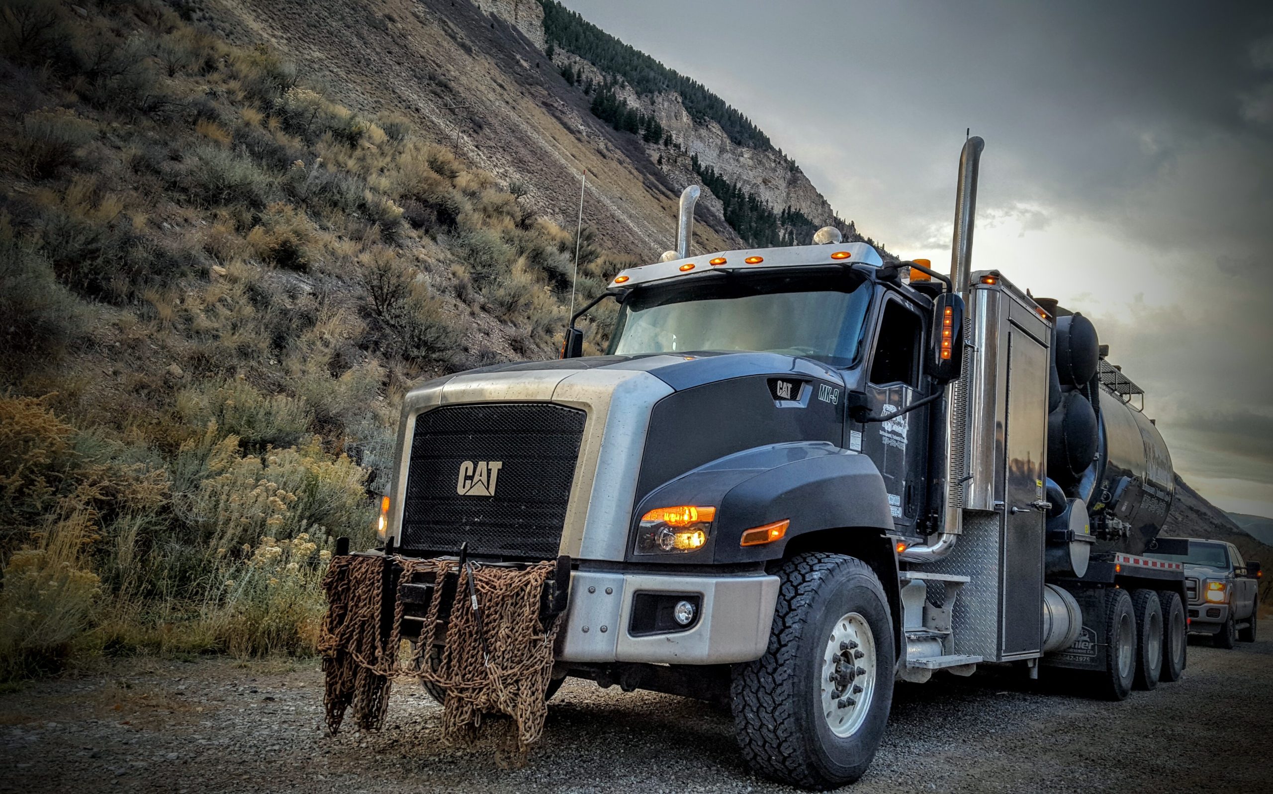 MK Hydrovac Inc dba Blac Frac Tanks | Parachute, Colorado | Heavy Machinery Hauling Services Eastern Utah Cleaning frac tanks. Frac tank cleaning.