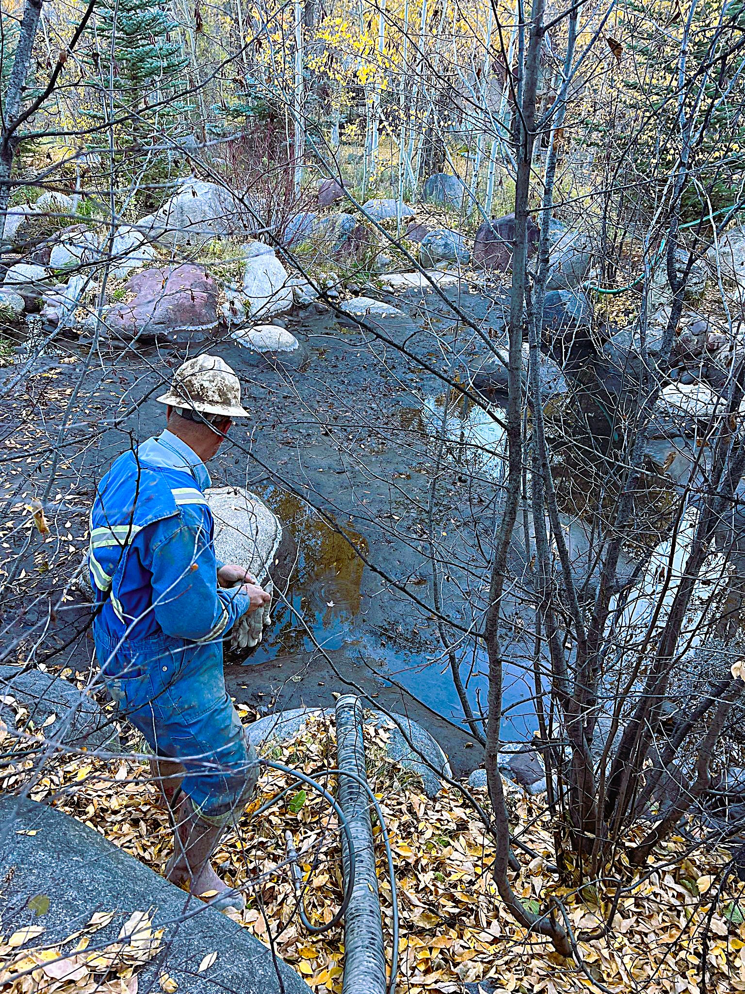 Removing filter material at fresh water treatment facility